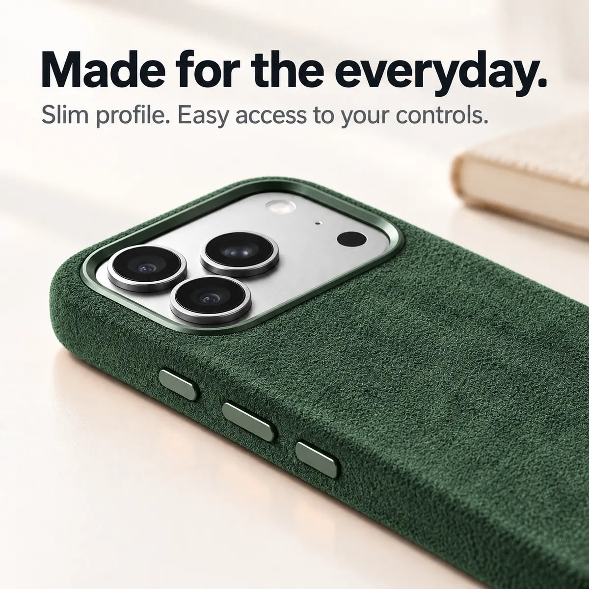 Dark green fabric phone case with a close view of its slim side and controls. #color_Forest Green