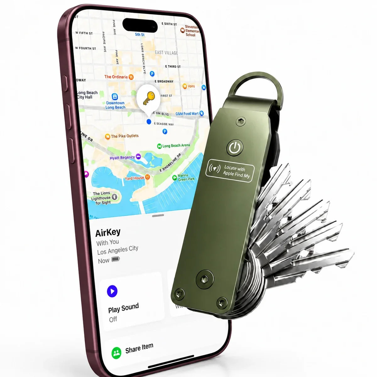 Spring Green tracking key organizer beside a Burgundy iPhone showing its location in Find My. #color_Spring Green