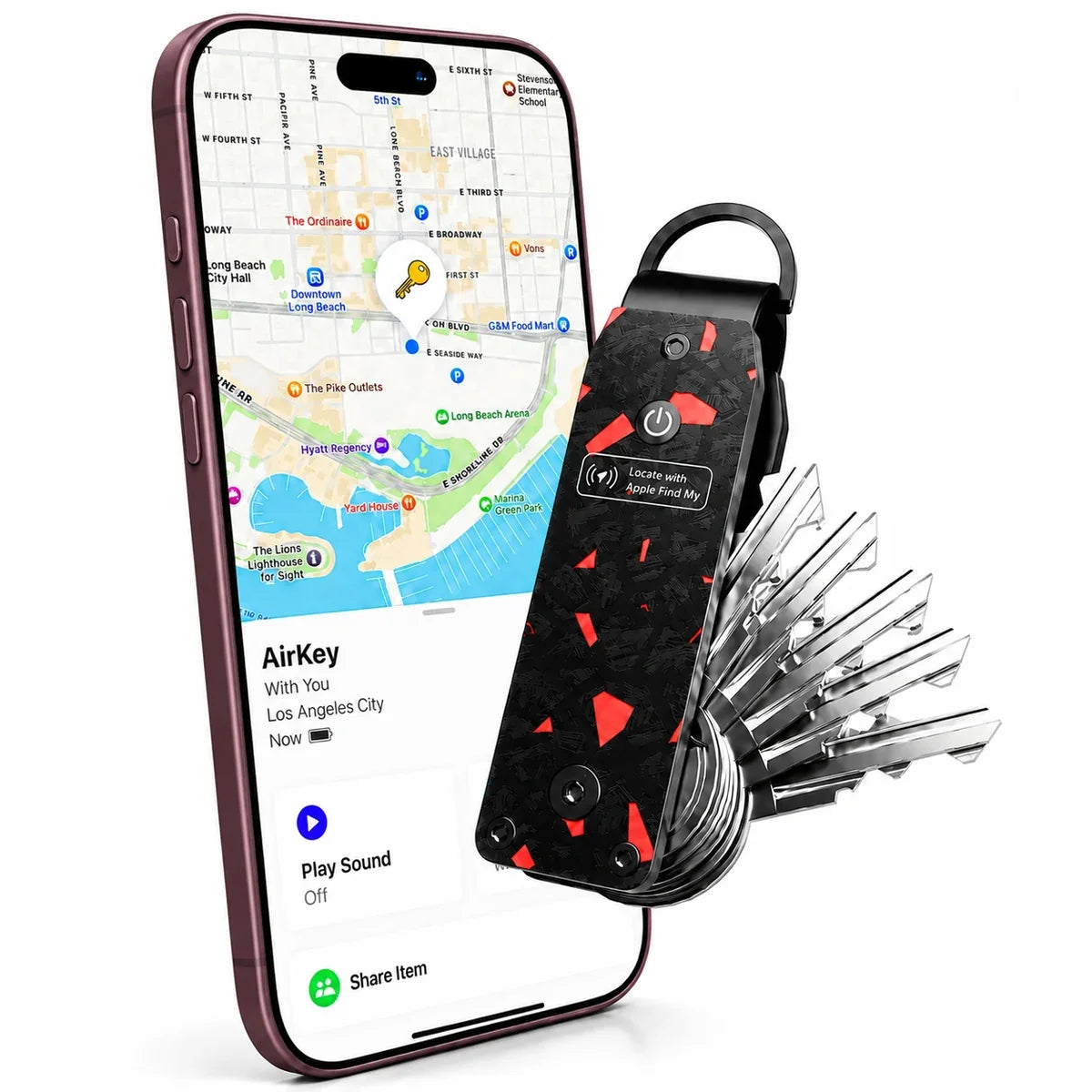 Carbon Red tracking key organizer beside a Burgundy iPhone showing its location in Find My. #color_Carbon Red