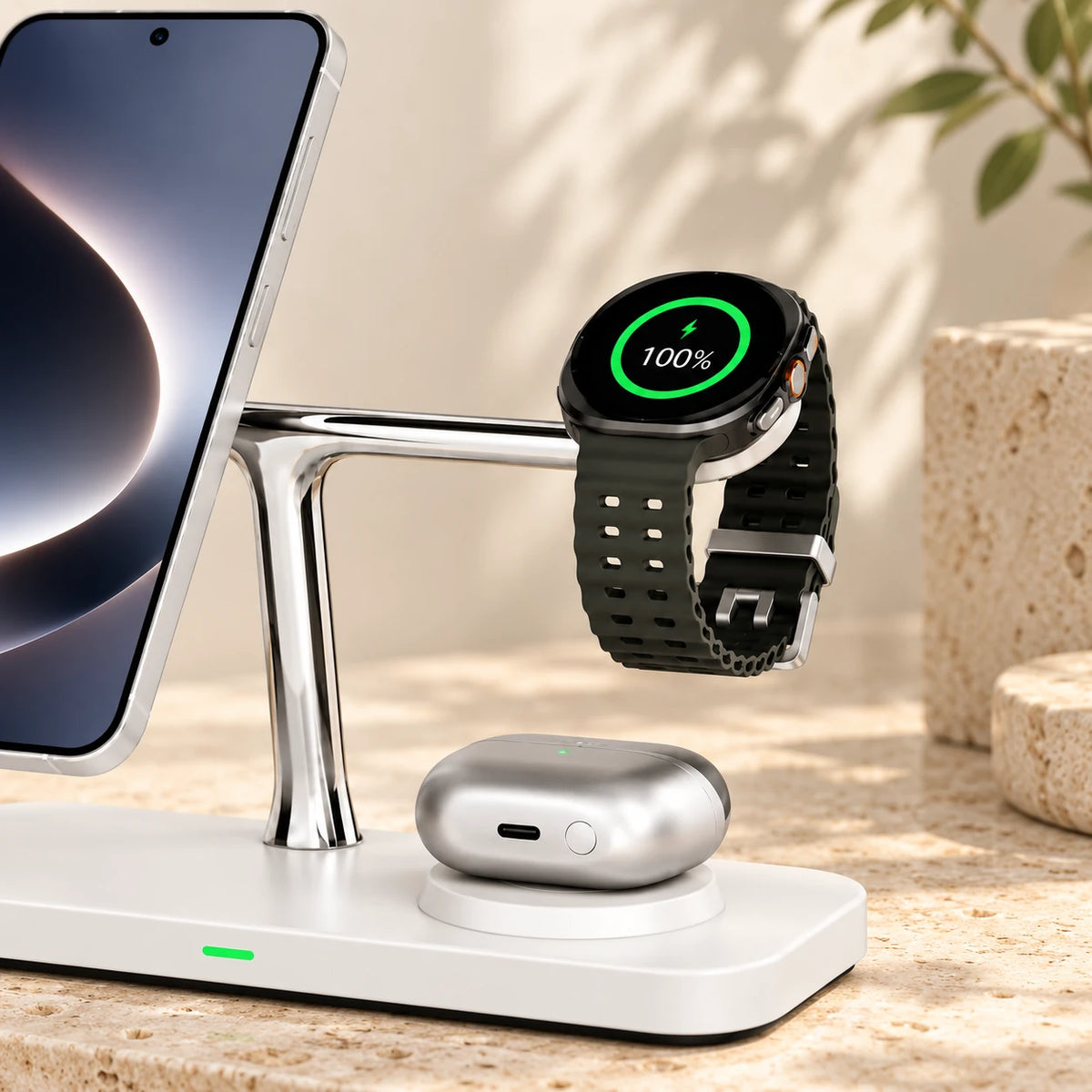 Round smartwatch on the right charging pad of a white desktop dock.