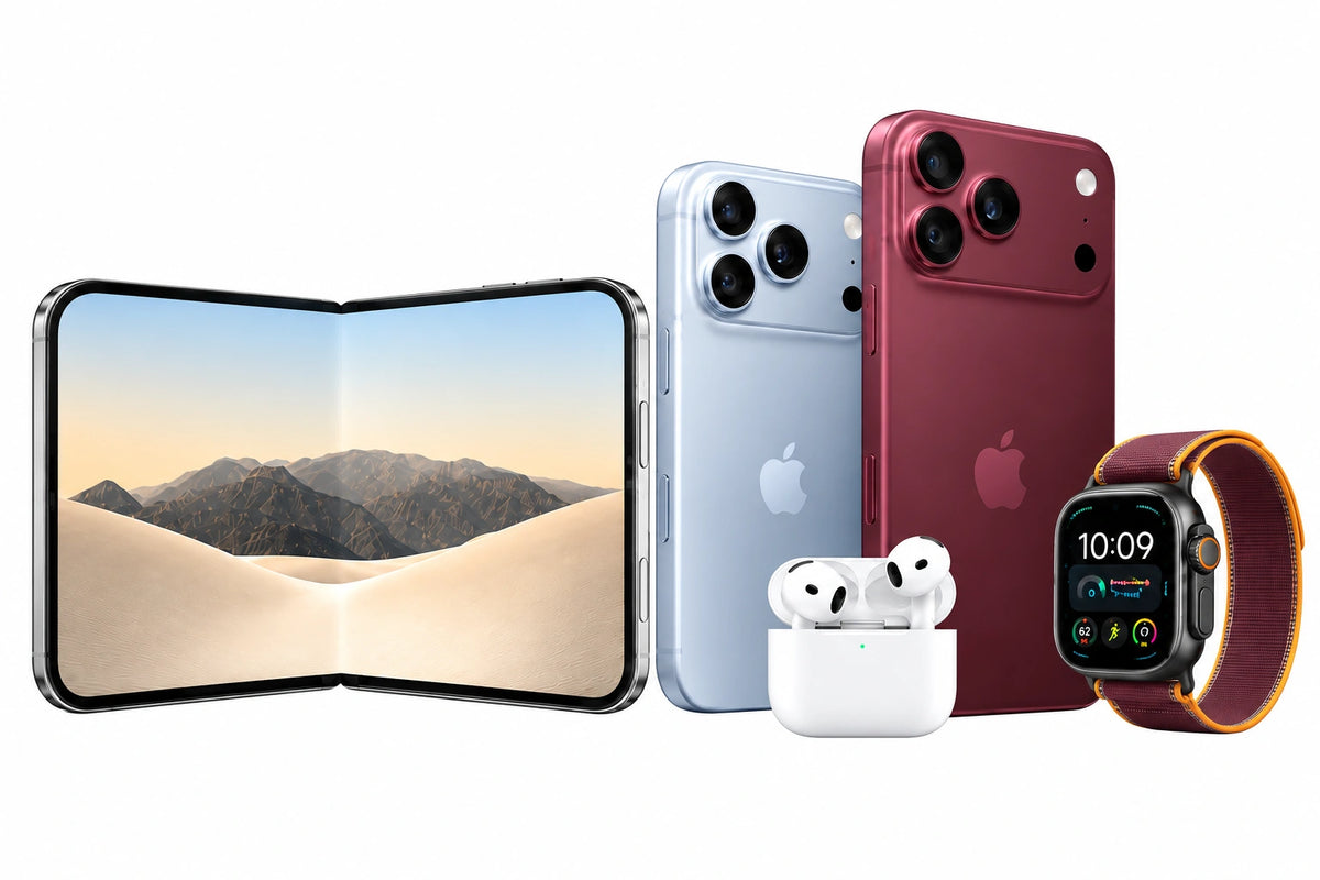 Apple devices on a softly lit silver surface with subtle reflections.
