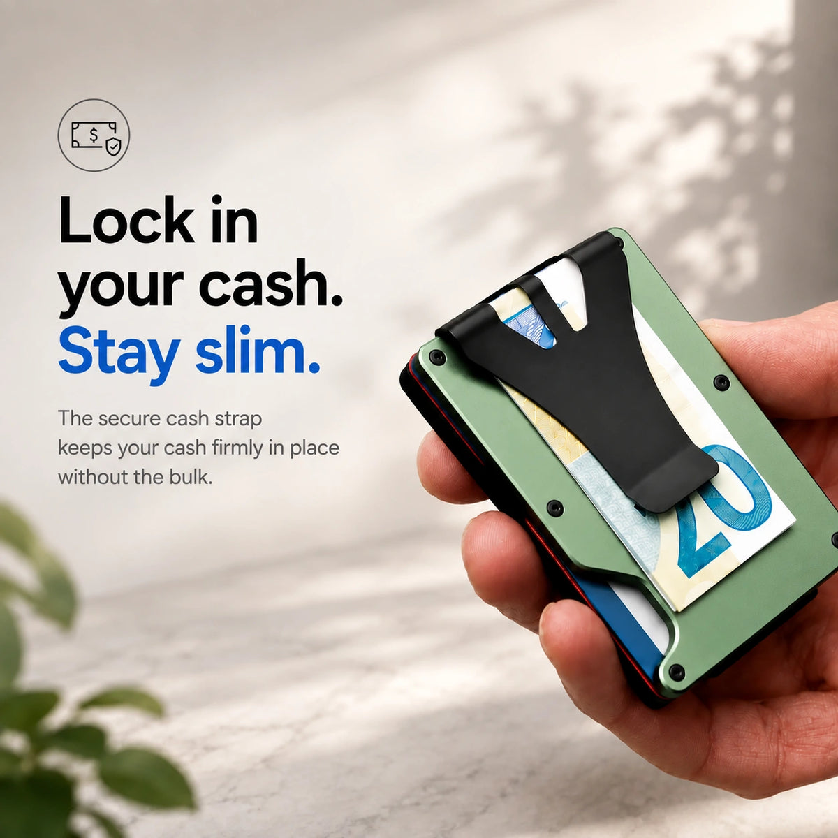 Arctic Green slim tracking card wallet holding cash under the clip #color_Arctic Green