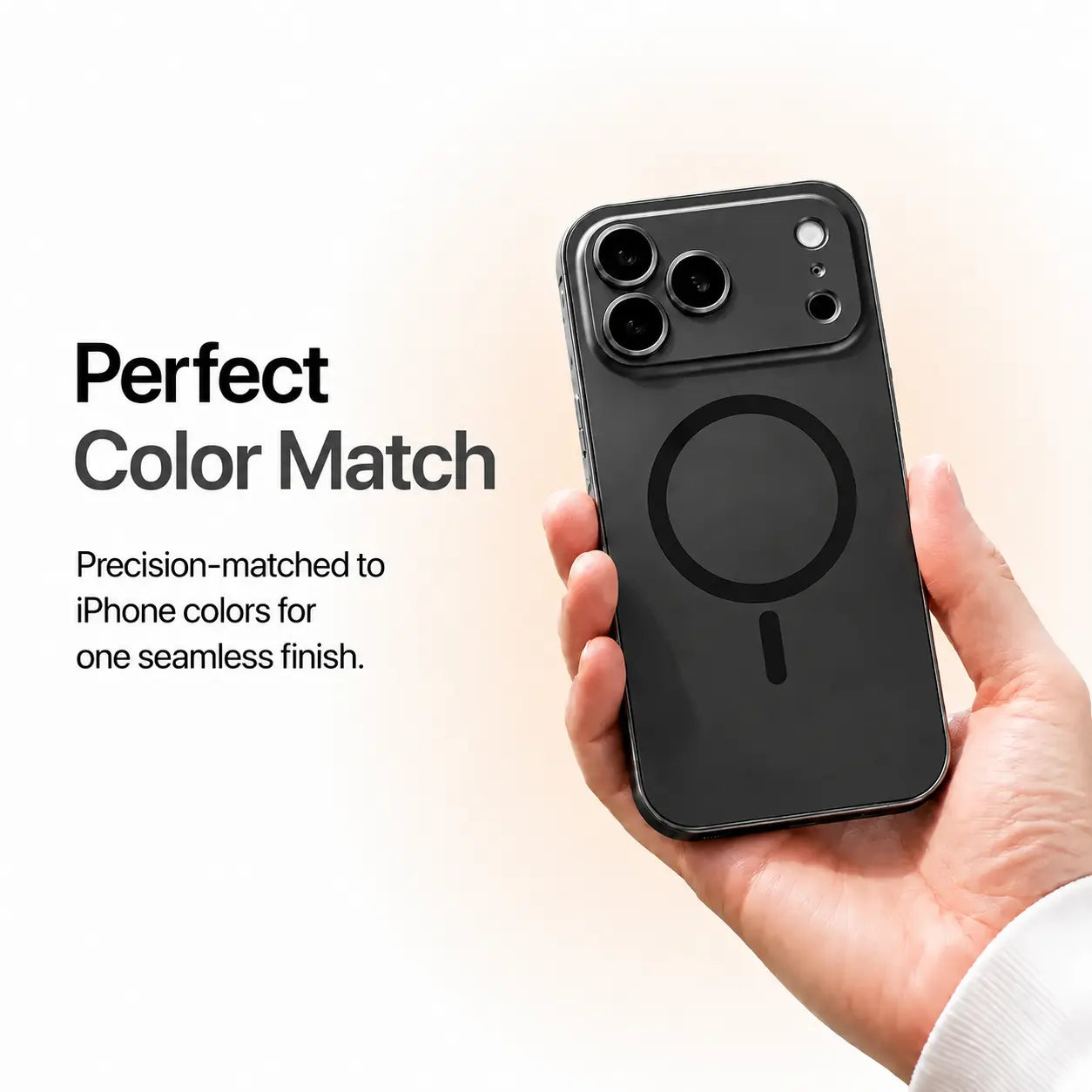 Black metal magnetic phone case held in one hand against a pale studio background #color_Midnight Black