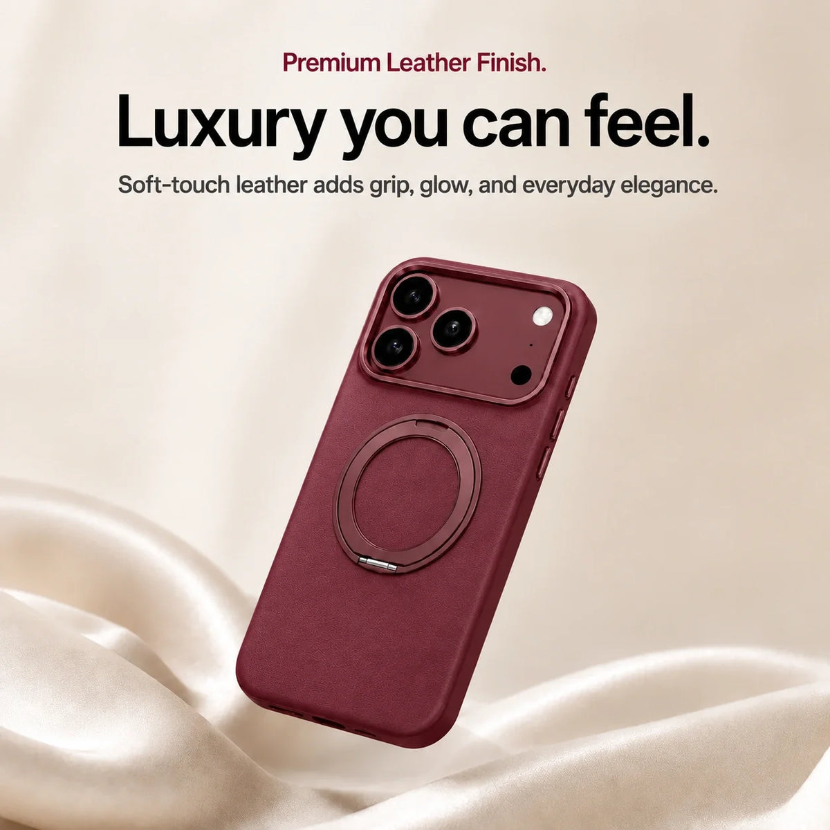 Burgundy leather-finish phone case above cream fabric to show the textured finish #color_Burgundy