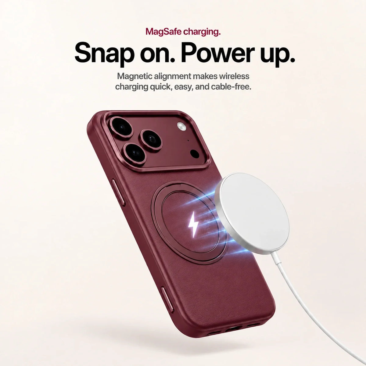 Burgundy leather-finish phone case beside a magnetic wireless charging puck #color_Burgundy