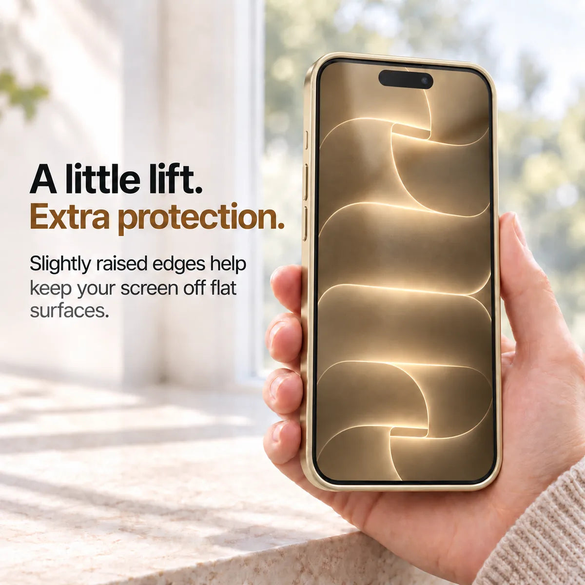 Champagne gold metal phone case held with the front display and raised screen edges visible #color_Champagne Gold