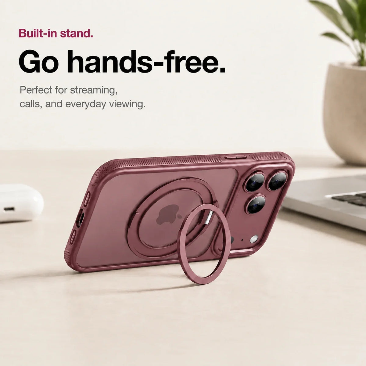 Burgundy clear phone case propped horizontally on its ring stand on a desk #color_Burgundy
