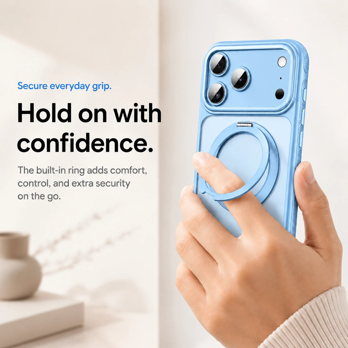 Glacier magnetic phone case held with a finger through the adjustable ring grip #color_Glacier
