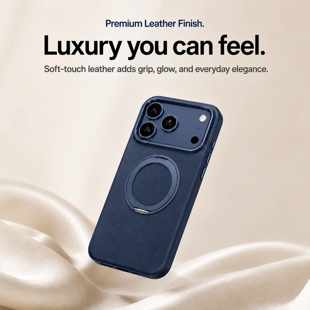 Navy blue leather phone case with a closed ring stand above soft cream fabric #color_Deep Blue
