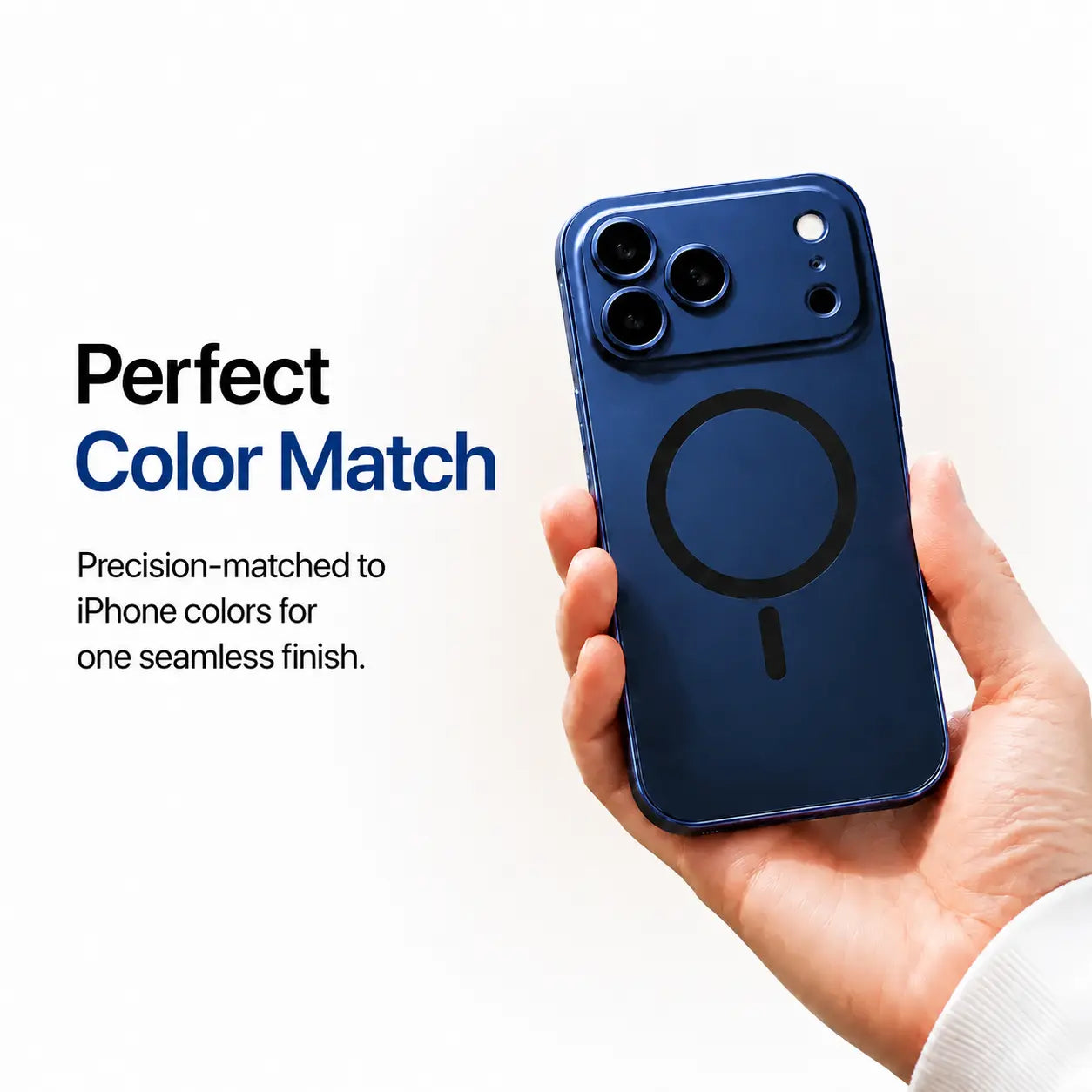 Navy blue metal magnetic phone case held in one hand against a pale studio background #color_Deep Blue