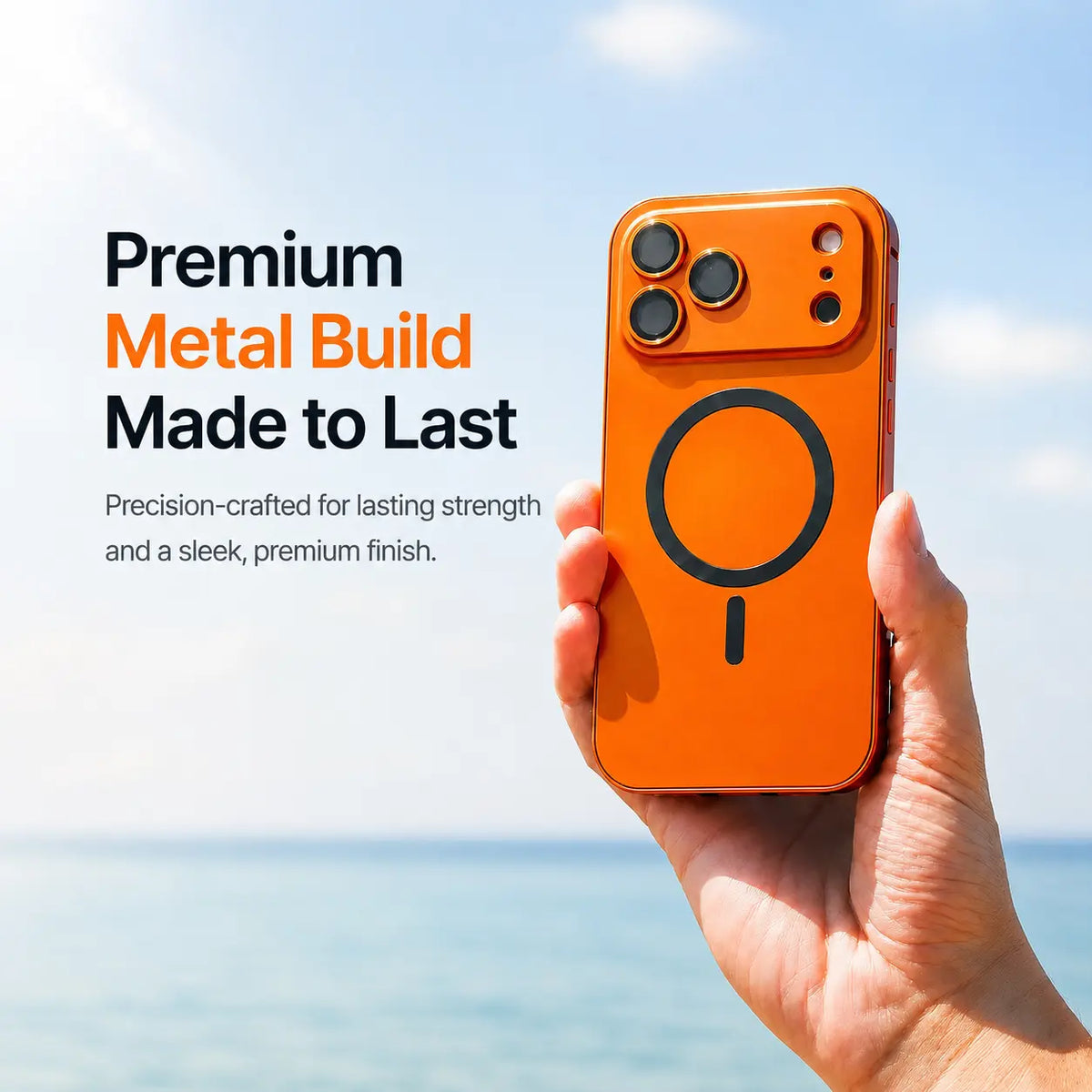 Orange metal magnetic phone case held upright beside the sea with a material feature caption #color_Cosmic Orange