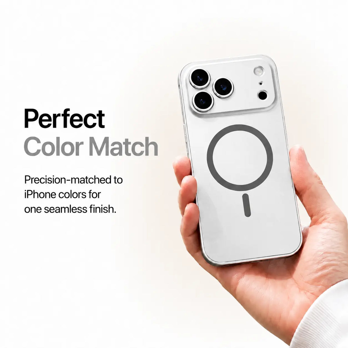 Silver metal magnetic phone case held in one hand against a pale studio background #color_Titanium Silver