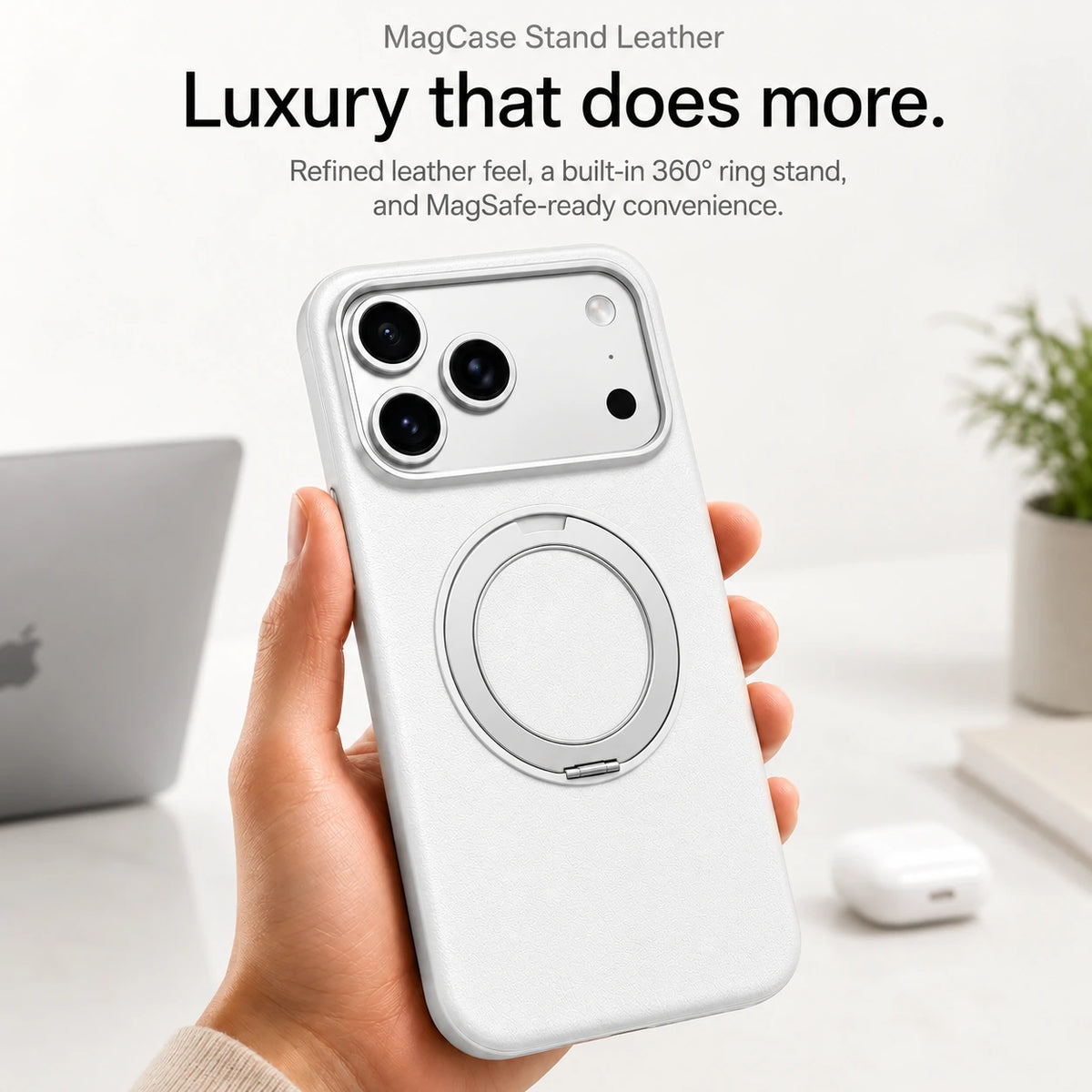 White leather phone case held upright at a desk with the ring stand folded flat #color_Polar White